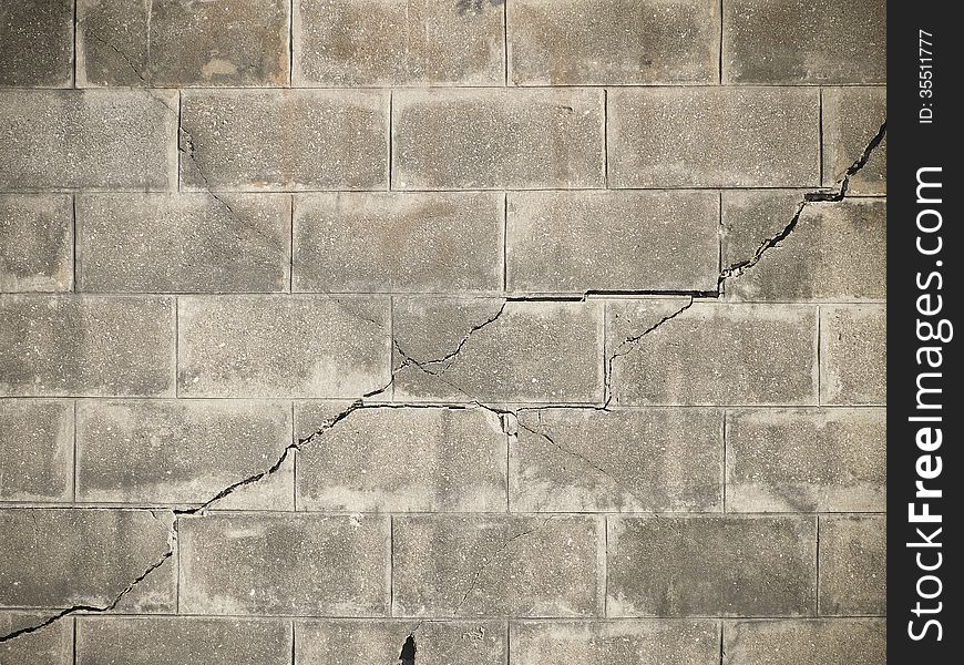 Cross line fracture on brick wall with vignett corner. Cross line fracture on brick wall with vignett corner