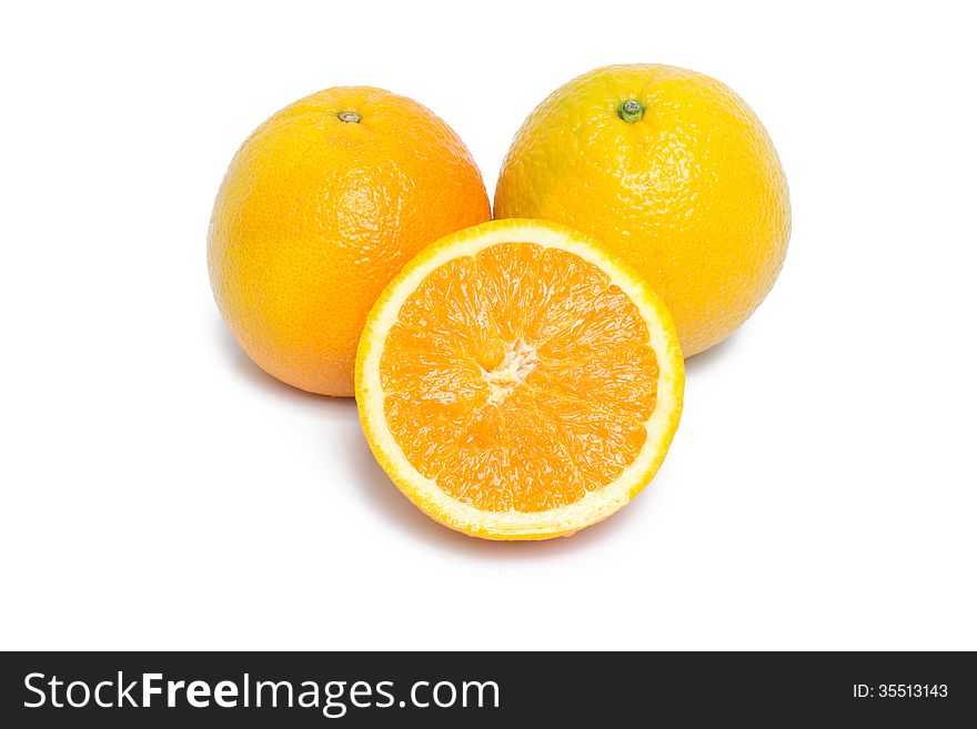 Orange fruit and half orange fruit on white background