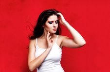 Beauty Portrait Of Woman With Colorful Makeup On Red Backround Royalty Free Stock Images
