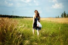 Woman Walking Through Sunshine Green And Yellow Corn Field Stock Photos Woman Walking Through Sunshine Green And Yellow Corn Field Stock Photos