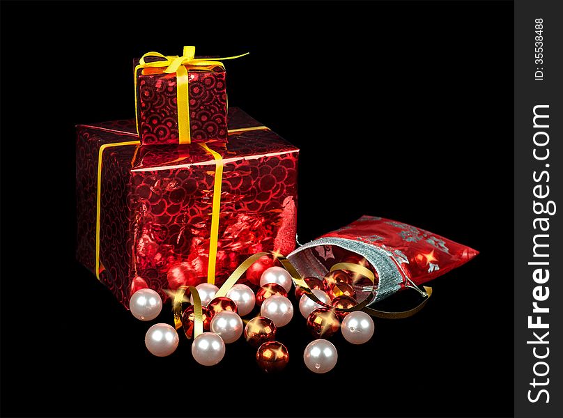 Christmas balls and gifts on a black background