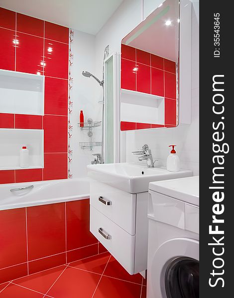 Modern Red Bathroom Interior With Mirror And Showe