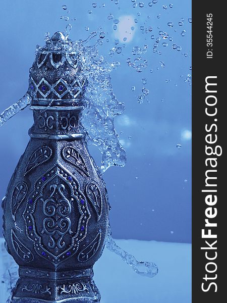Arabian Oud - The Scent of Luxury bottel - under water shower. Arabian Oud - The Scent of Luxury bottel - under water shower