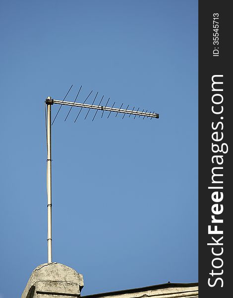 TV antenna aerial on the roof of the sky and