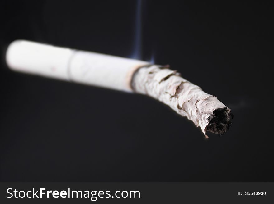 Cigarette On A Dark Background