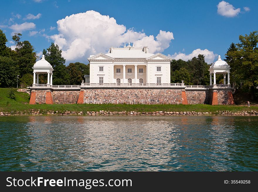 Tyshkevich Palace near Galve lake in Trakai, Lithuania on a beautiful summer day. Tyshkevich Palace near Galve lake in Trakai, Lithuania on a beautiful summer day.