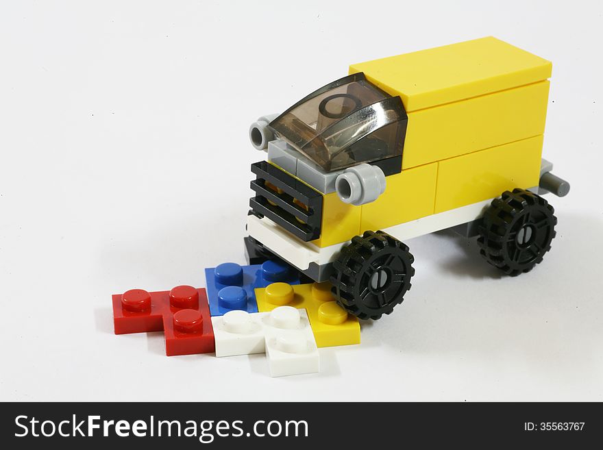 Children's toy the car make by  bricks. Children's toy the car make by  bricks