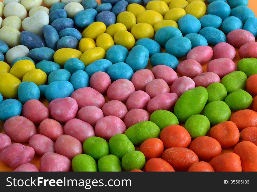 Multi-colored candies arranged in diagonal. Multi-colored candies arranged in diagonal