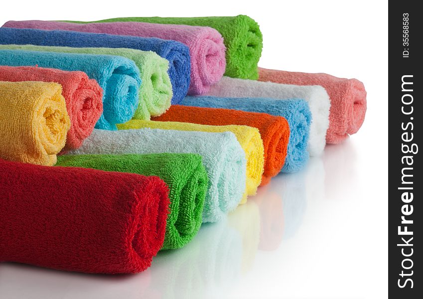 Set Of Colored Towels On White.