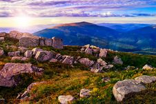 Stones On A Hill In Front Of The Mountain Stock Photo Stones On A Hill In Front Of The Mountain Stock Photo