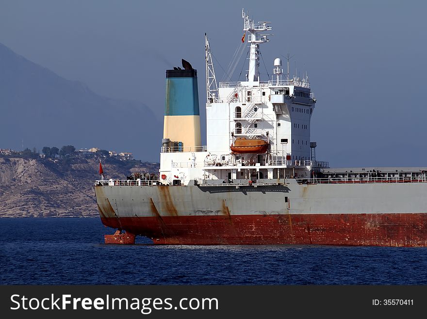 General cargo vessel in the anchorage of Alicante bay. General cargo vessel in the anchorage of Alicante bay