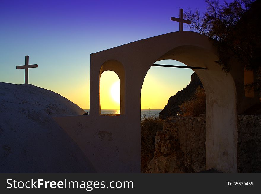 Sunrise through the arches,Santorini