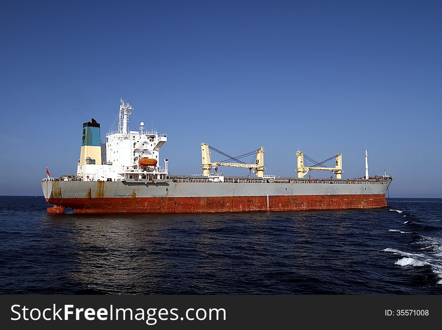 General cargo vessel in the anchorage of Alicante bay