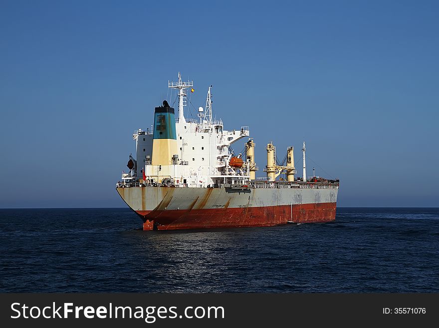 General cargo vessel in the anchorage of Alicante bay