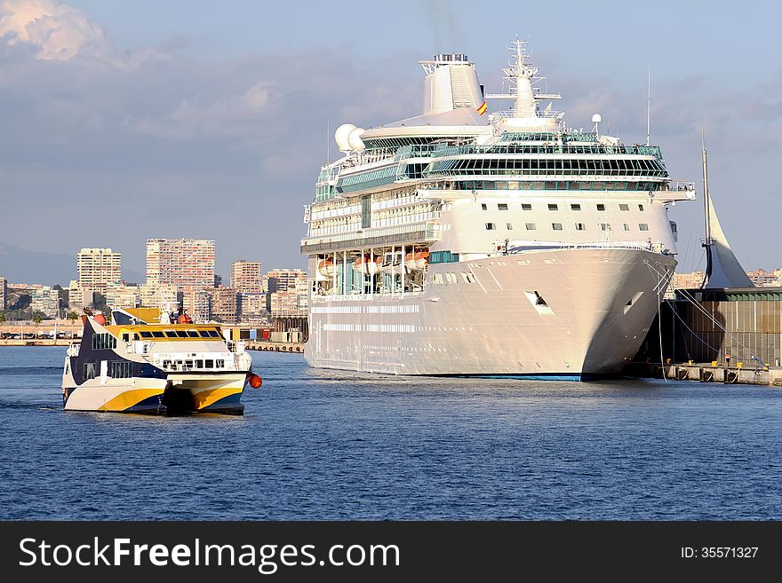 Modern cruise and touristic ferry in Alicante harbor