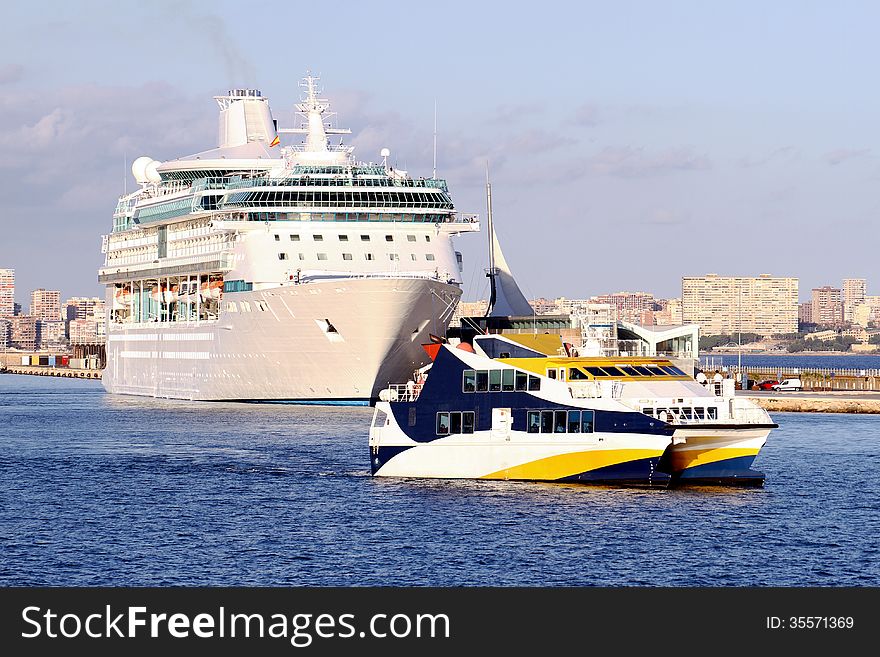 Modern cruise and touristic ferry in Alicante harbor