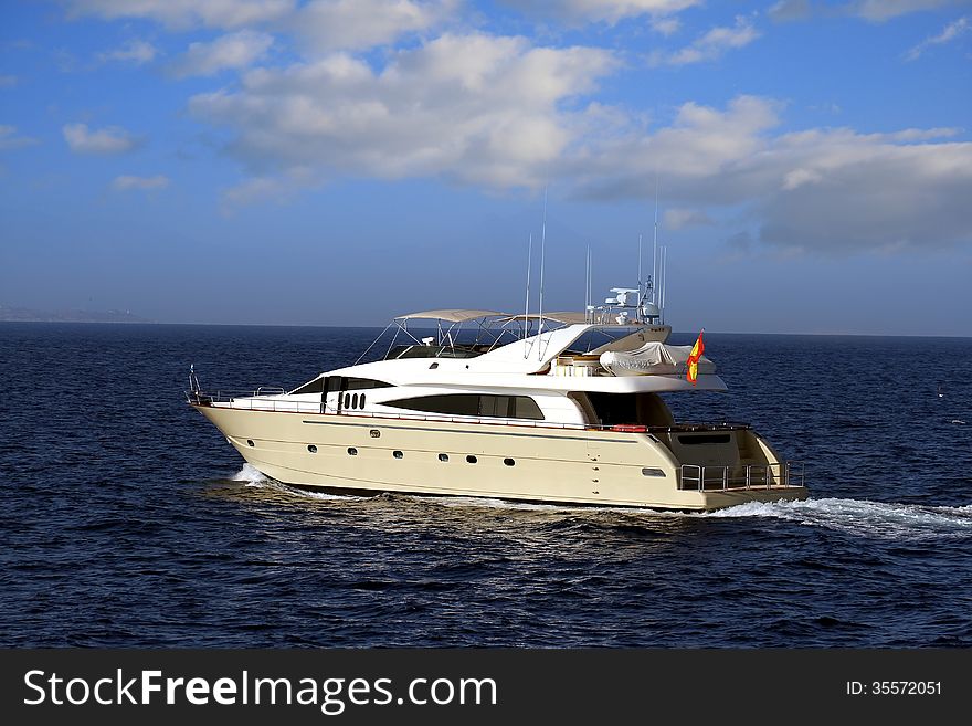 Private yacht sailing in open waters