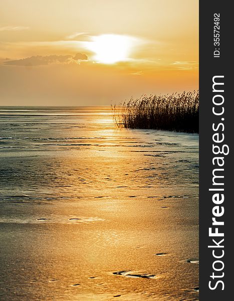 Sunset in winter from a froze lake (lake Balaton,HUngary)