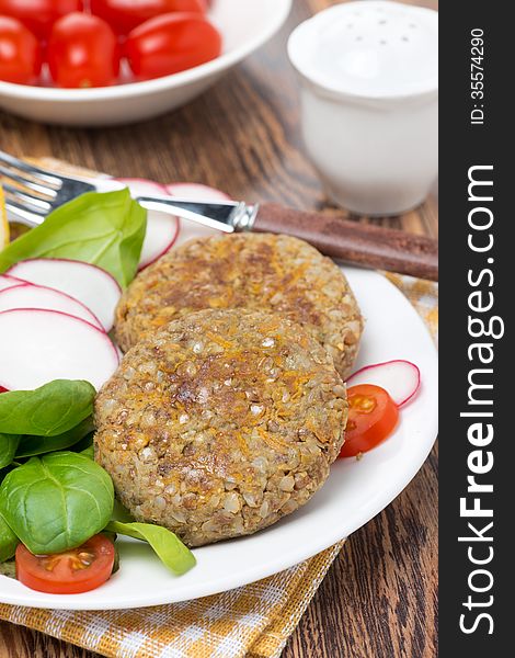 Vegetarian burgers made from lentils and buckwheat, close-up