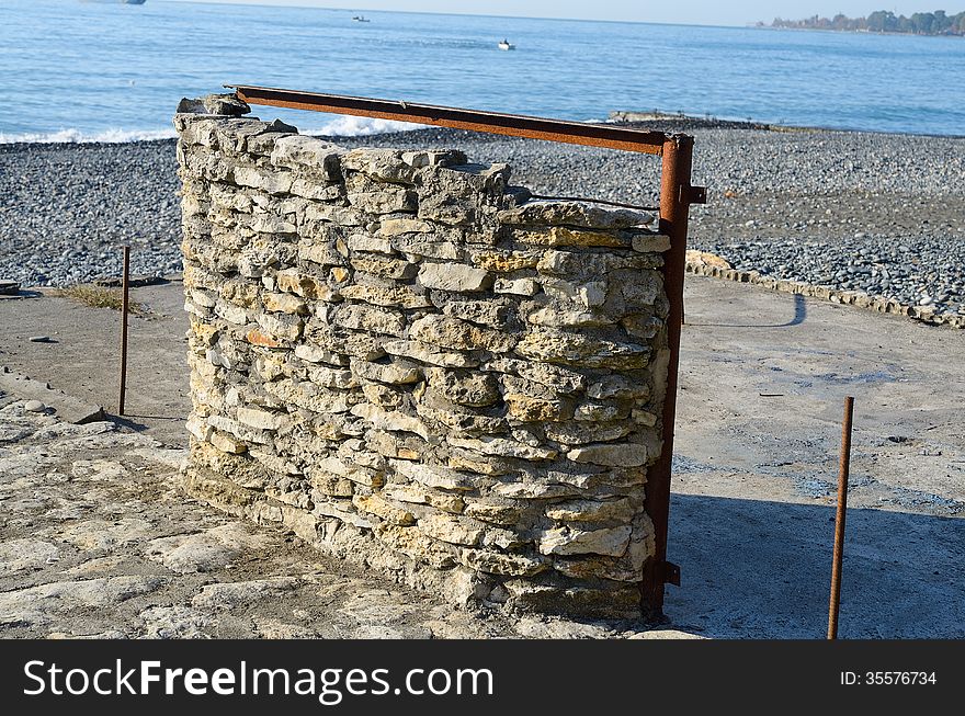 Stone Wall On The Beach