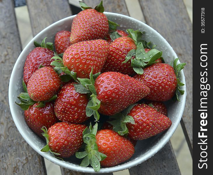 Strawberries in a bowl on a table