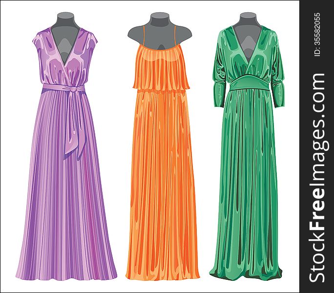 The composition of the three females evening dresses of silk. Dresses hanging on mannequins on the white background. The composition of the three females evening dresses of silk. Dresses hanging on mannequins on the white background