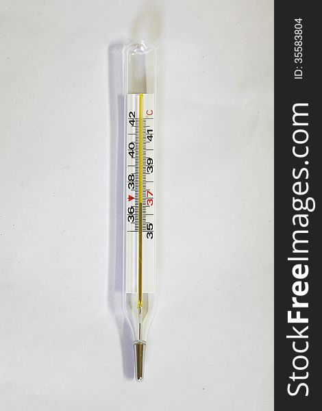 Thermometer, in close-up, over white background. Mercury style, with centigrade markings.