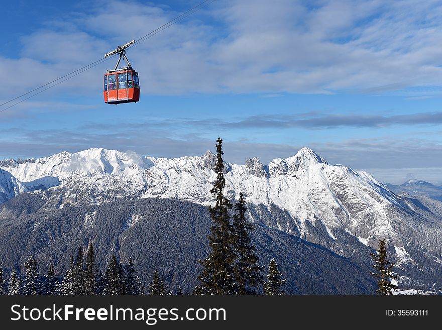 Ski lift chairs on bright winter day