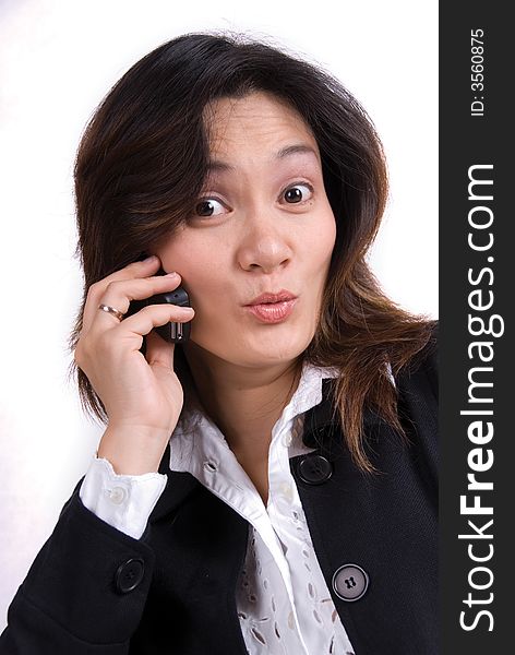 Business girl on the phone over a white background