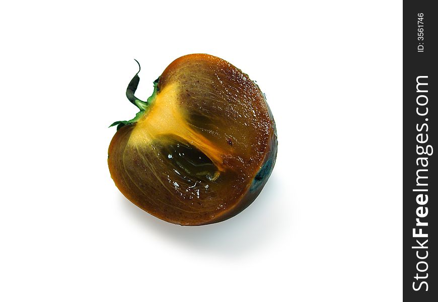 The cut persimmon on a white background.