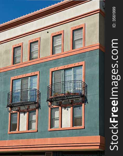 Architectural details of modern building with windows and balconies