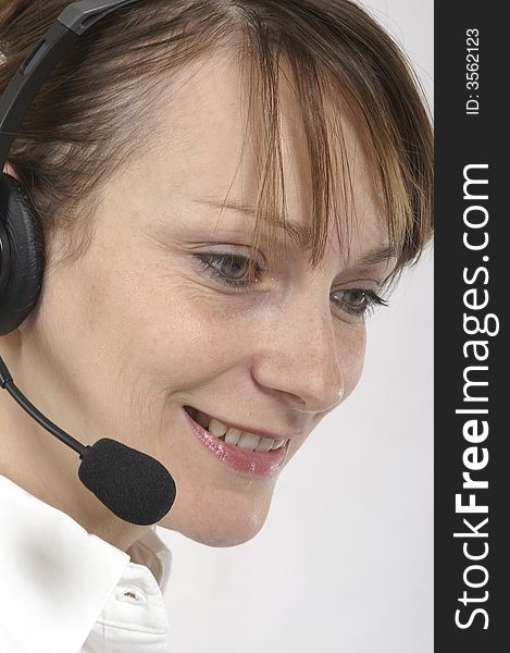 Customer service agent with headphones on head