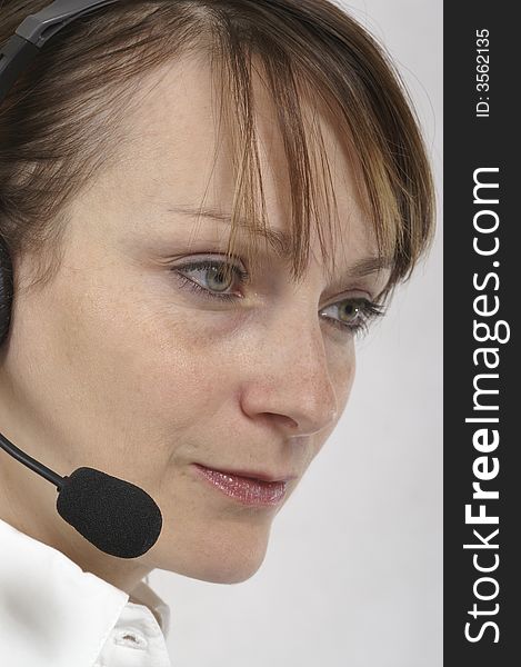 Customer service agent with headphones on head