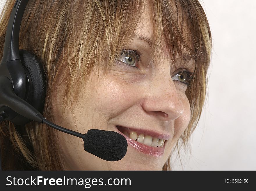 Customer service agent with headphones on head