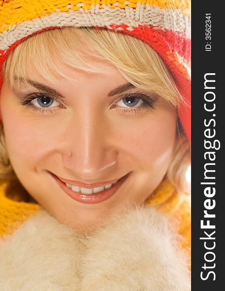 Sweet girl in winter clothing close-up portrait