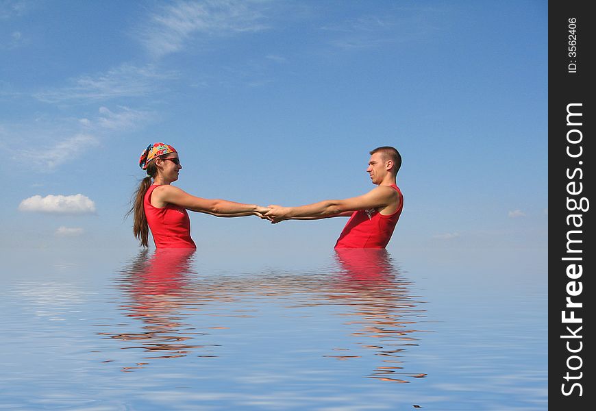 Whizzing couple in water