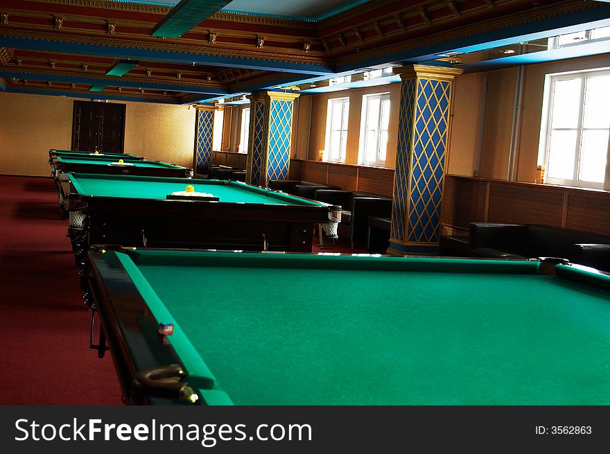 Billiard tables in fashionable and modern hotel