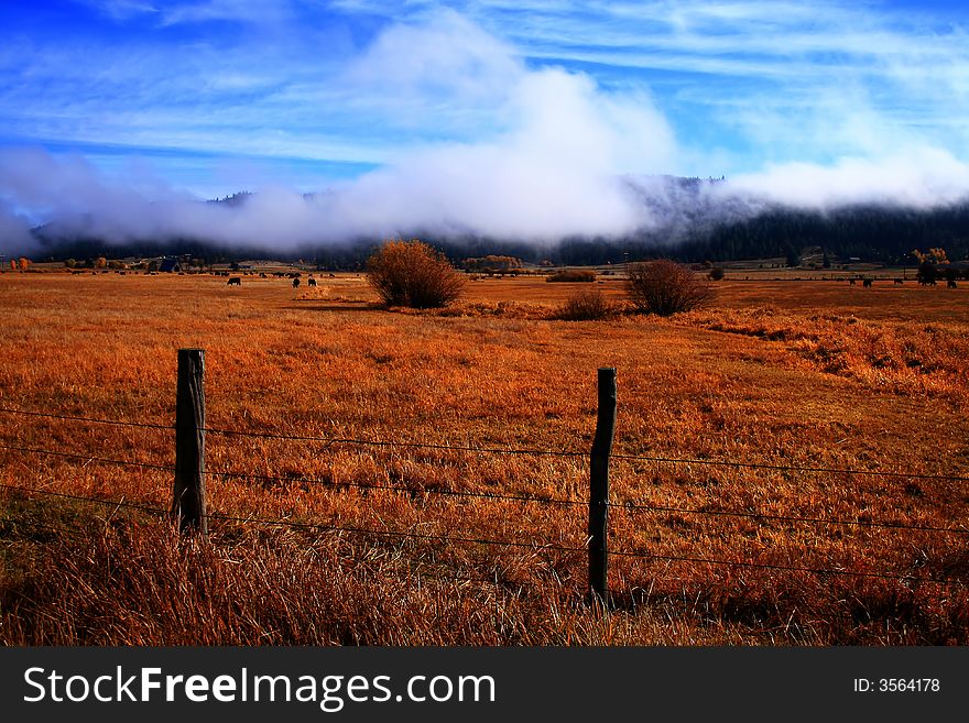 Low clouds hang of Long Valley on fall morning, Idaho. Low clouds hang of Long Valley on fall morning, Idaho