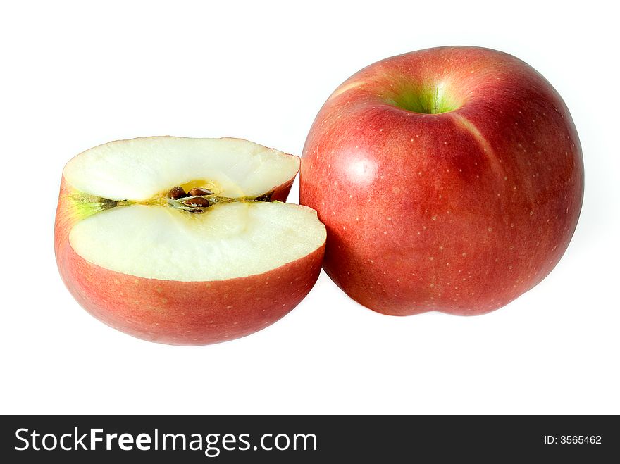 Two red apples are photographed on a white background. Two red apples are photographed on a white background