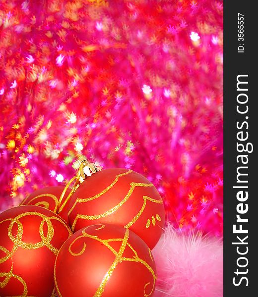 Red christmas balls with tinsel background