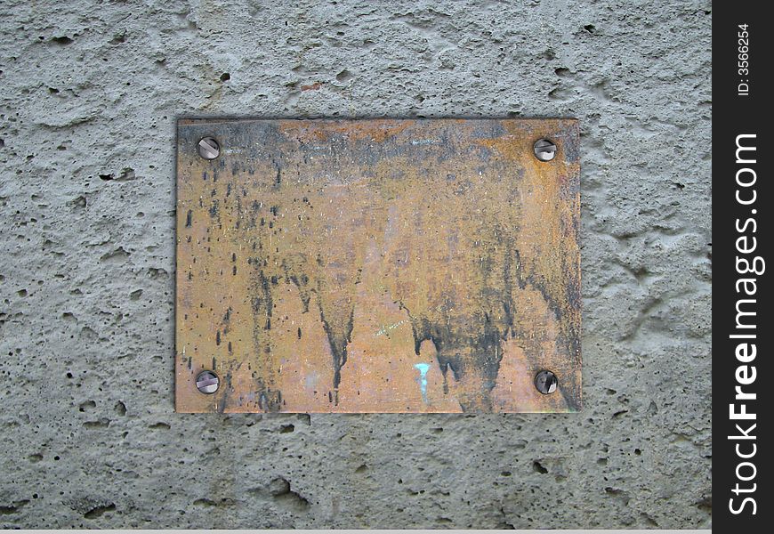 The rusty old metal tablet. The rusty old metal tablet