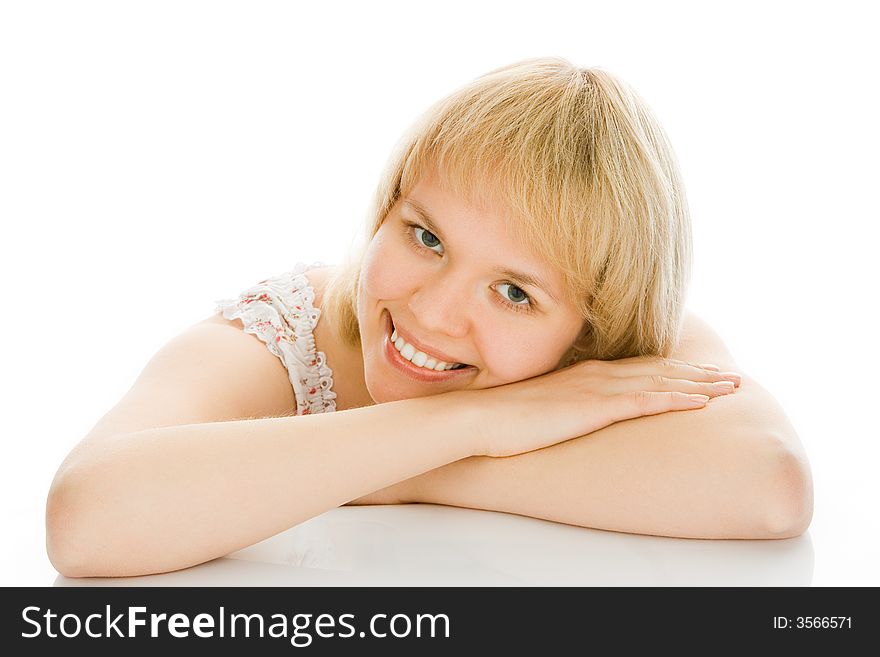 Beauty woman sit on the table over white background