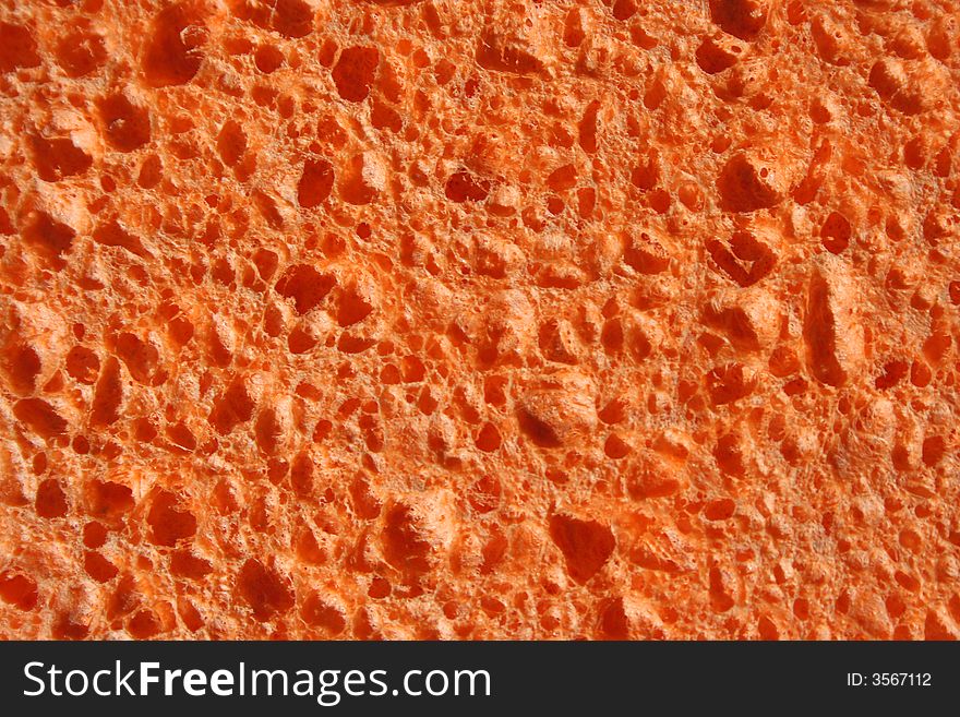 A close up Orange Sponge abstract background. A close up Orange Sponge abstract background