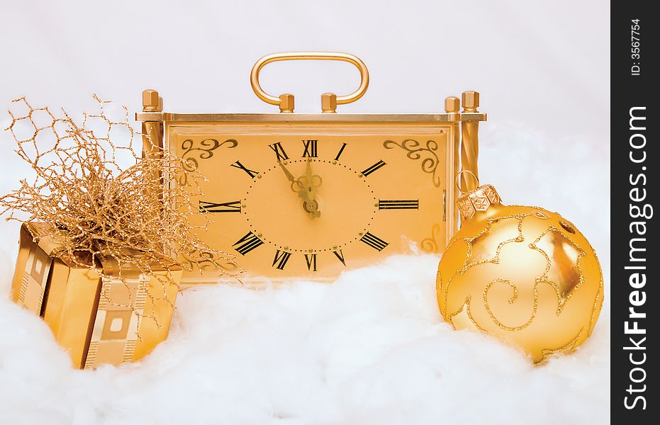 Golden clock shows five minutes till New Year. Golden clock shows five minutes till New Year