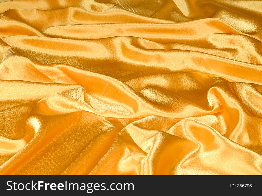 Gold color textile abstract background. Gold color textile abstract background