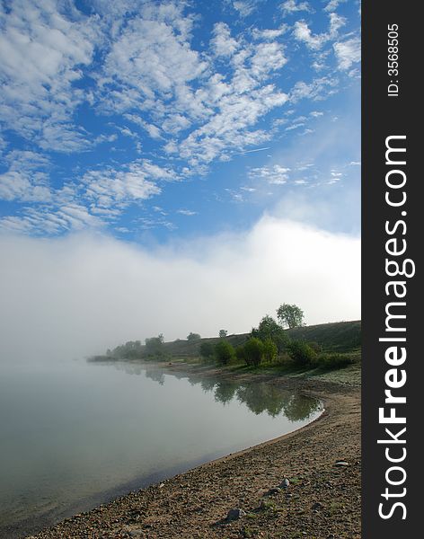 Foggy morning on lake