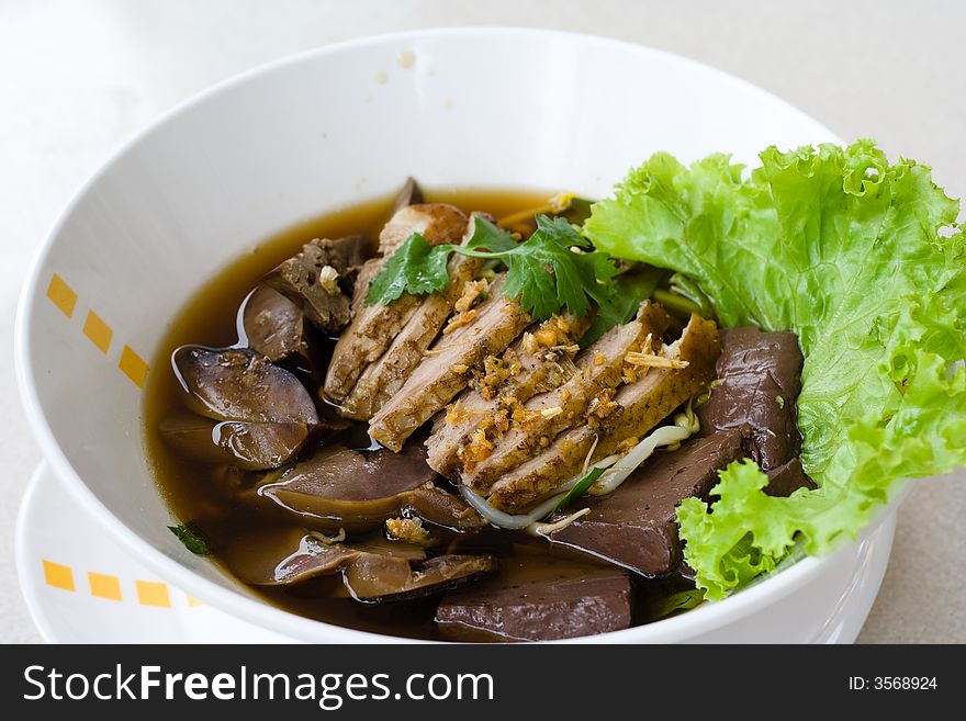 Image of pot-stewed duck with soup. Image of pot-stewed duck with soup