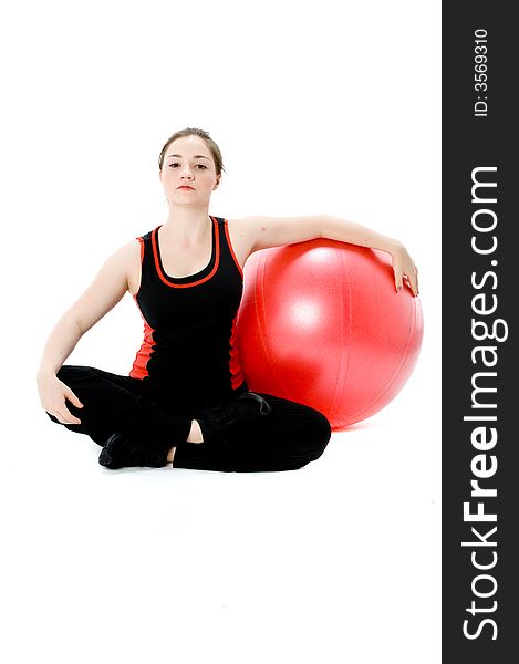 A young caucasian girl doing different stretches. A young caucasian girl doing different stretches