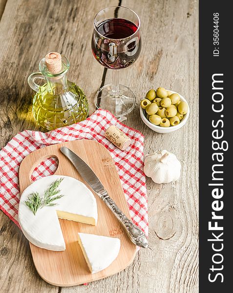 Camembert cheese and red wine