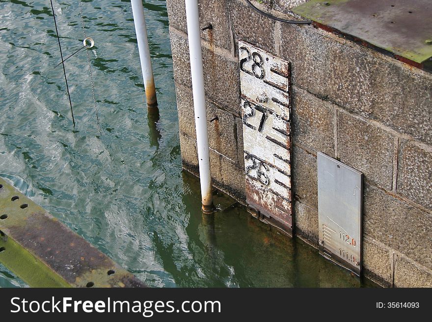 Water level indication on the marina barrage dam in Singapore, very much similar to the purpose of a plimsoll line on a ship. Water level indication on the marina barrage dam in Singapore, very much similar to the purpose of a plimsoll line on a ship.